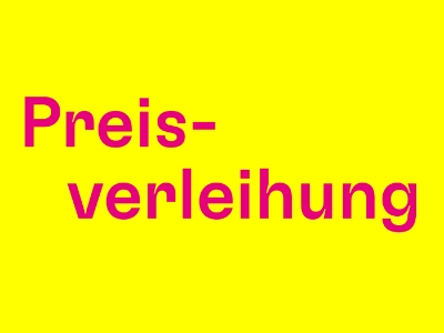 Schriftzug Preisverleihung in Magenta auf gelbem Grund